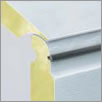 Seals are fitted between the individual sections of the door across the entire width for overall door.